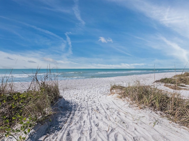 property view of water featuring a view of the beach