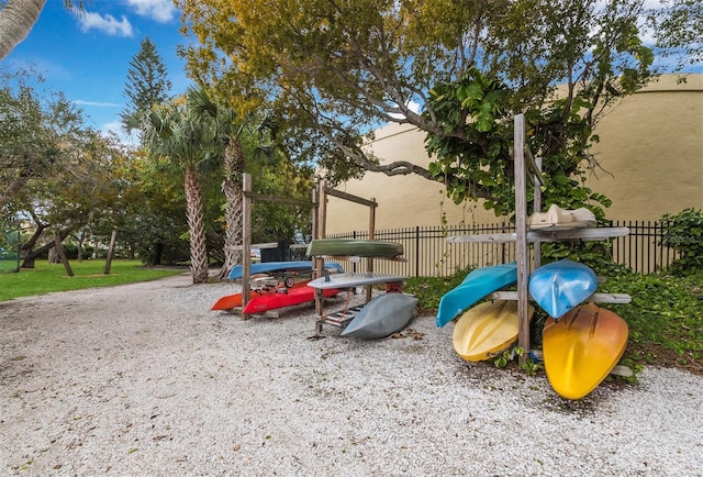view of jungle gym with fence