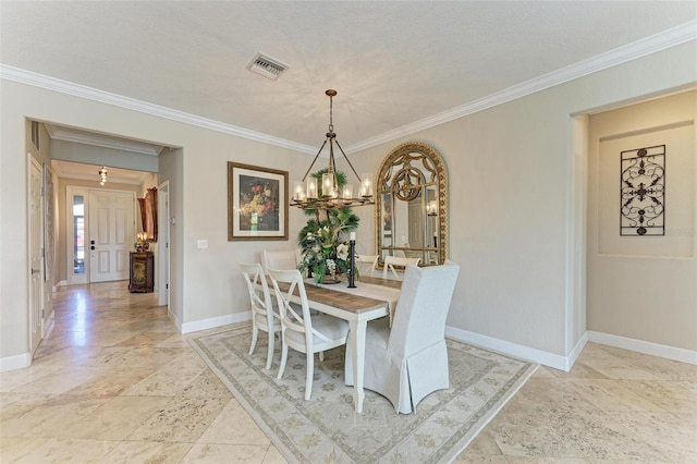 dining room featuring crown molding