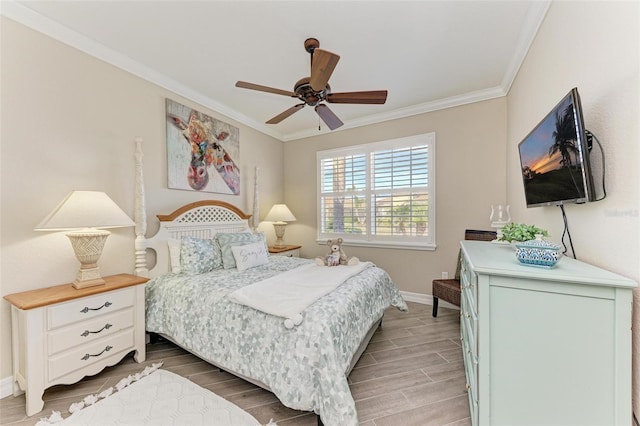 bedroom featuring ceiling fan, crown molding, and wood-type flooring