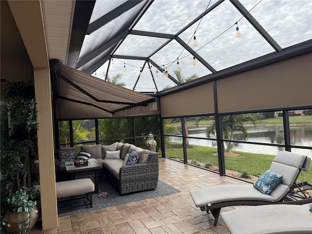 view of patio featuring an outdoor living space and a water view