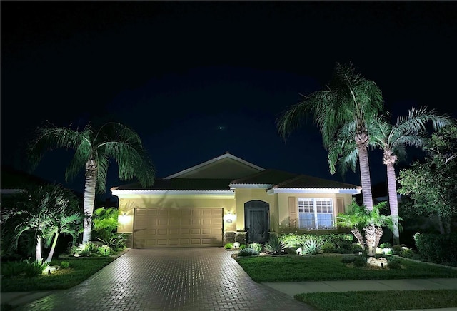 view of front of home with a garage