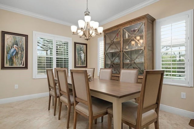 dining room with a notable chandelier and ornamental molding