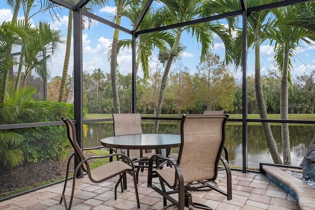 sunroom with a water view