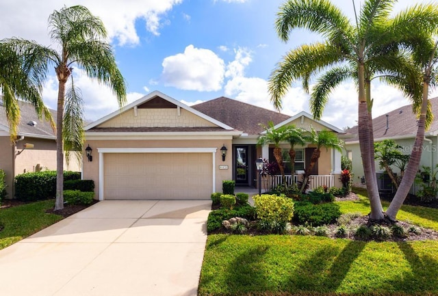 view of front of house with a porch and a garage