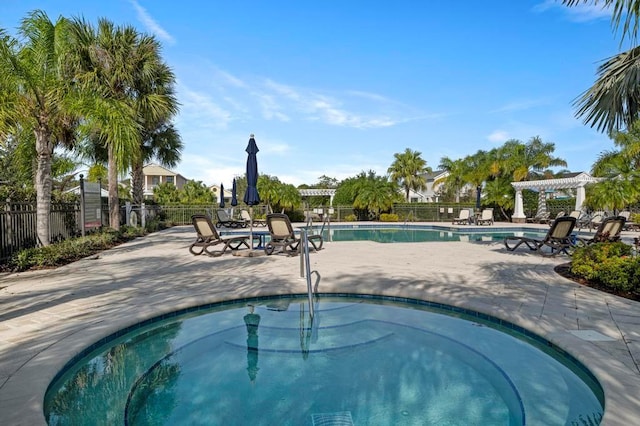 view of pool featuring a pergola and a patio area