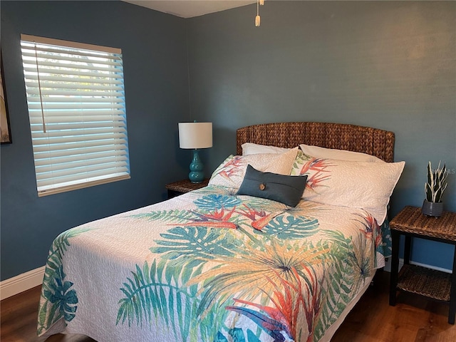 bedroom featuring wood-type flooring