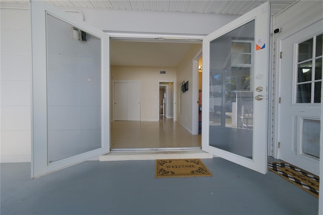 property entrance featuring a garage