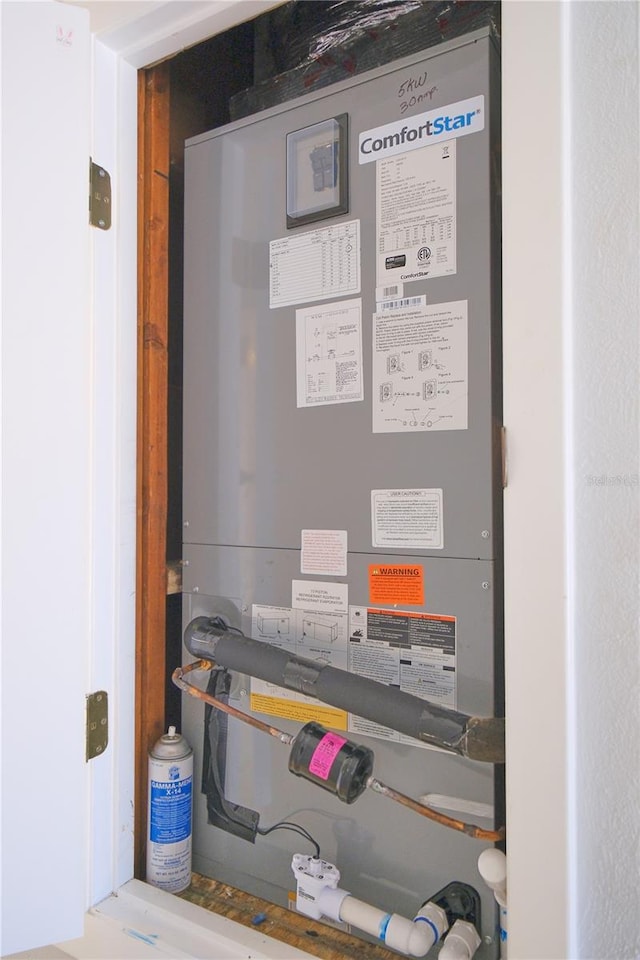 utility room with heating unit