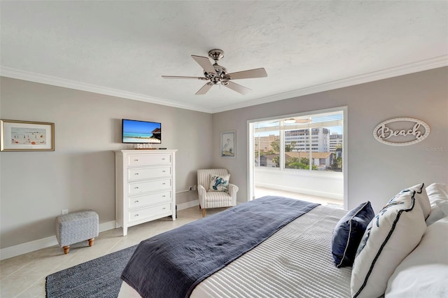 bedroom featuring ceiling fan, light tile patterned floors, and ornamental molding