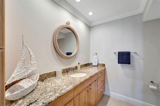 bathroom featuring tile patterned floors, vanity, and crown molding