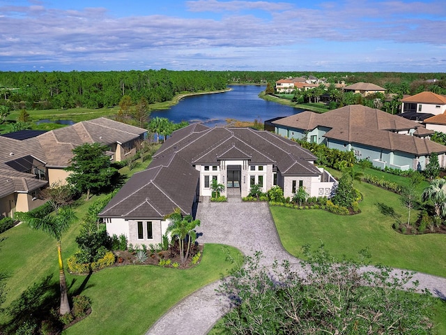 drone / aerial view with a water view