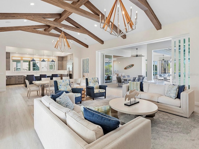 living room featuring ceiling fan with notable chandelier, beam ceiling, high vaulted ceiling, and light hardwood / wood-style flooring