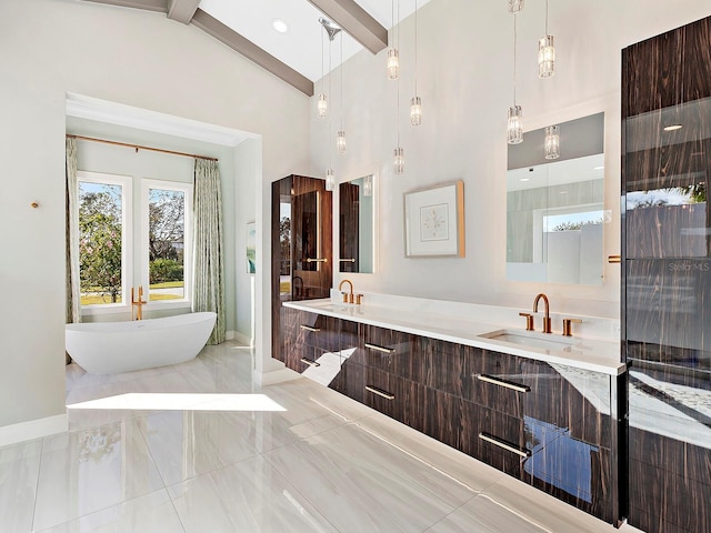 bathroom with beam ceiling, vanity, high vaulted ceiling, and a tub