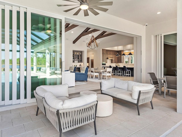 view of patio / terrace featuring outdoor lounge area and ceiling fan