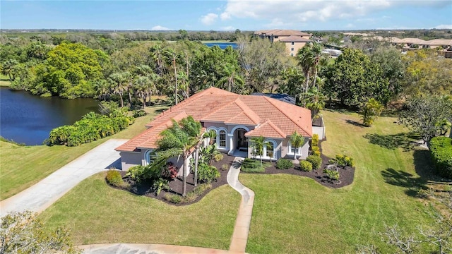 birds eye view of property featuring a water view