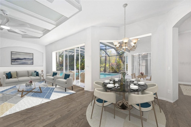 dining space featuring beam ceiling, dark hardwood / wood-style flooring, and a notable chandelier