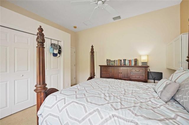 bedroom with ceiling fan and light carpet