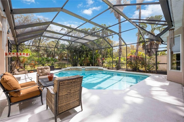 view of pool with an outdoor living space, a patio, and glass enclosure