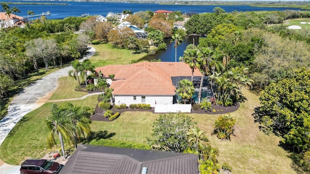 drone / aerial view with a water view