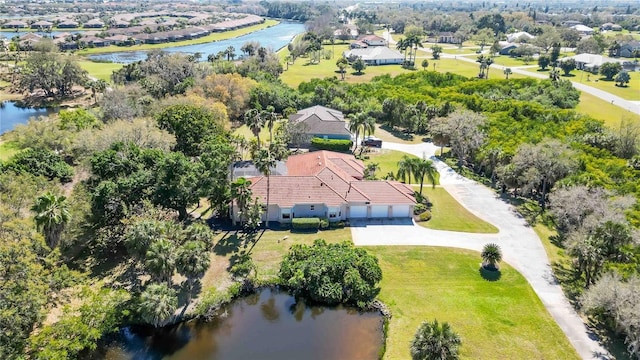 birds eye view of property featuring a water view