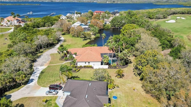 birds eye view of property featuring a water view