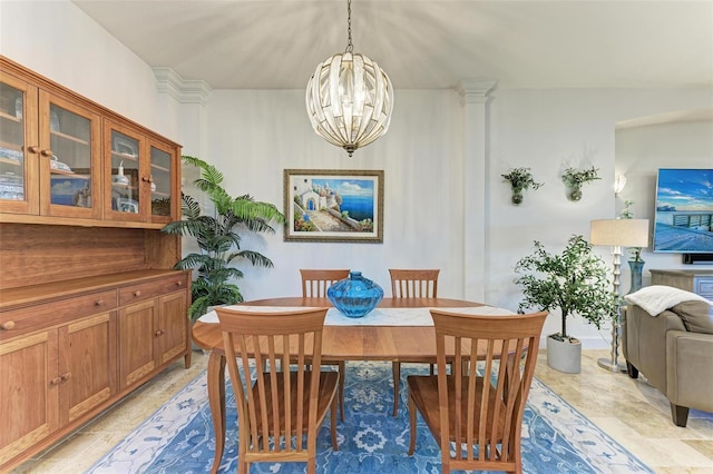 dining room featuring an inviting chandelier