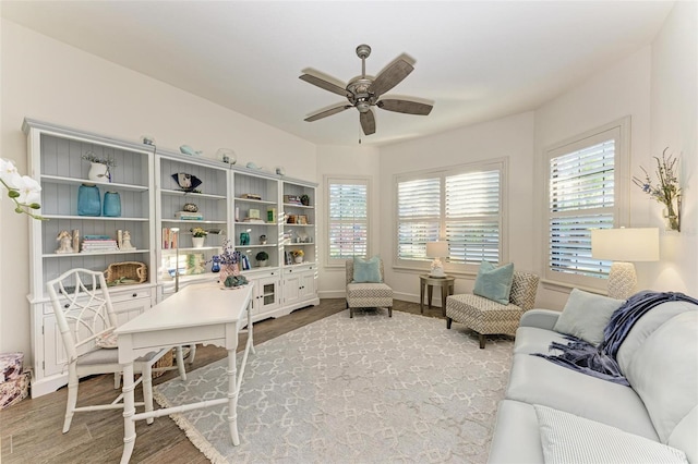 interior space featuring hardwood / wood-style floors and ceiling fan