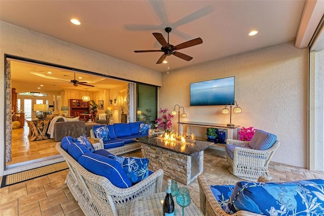 living room with ceiling fan