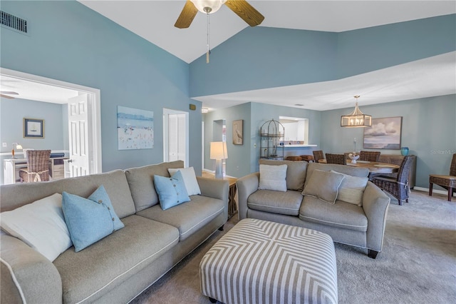 living room featuring ceiling fan, carpet floors, and high vaulted ceiling