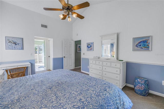 carpeted bedroom featuring multiple windows, high vaulted ceiling, and ceiling fan