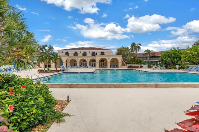 view of swimming pool featuring a patio area