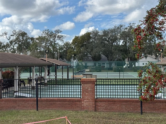 exterior space with tennis court