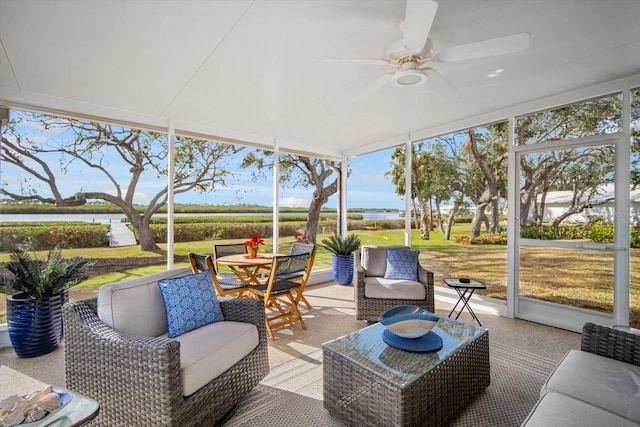 sunroom / solarium with ceiling fan and a wealth of natural light