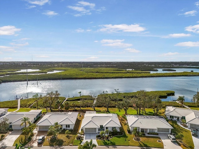 drone / aerial view with a water view