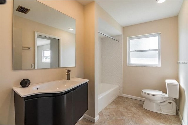 full bathroom featuring vanity, tub / shower combination, and toilet