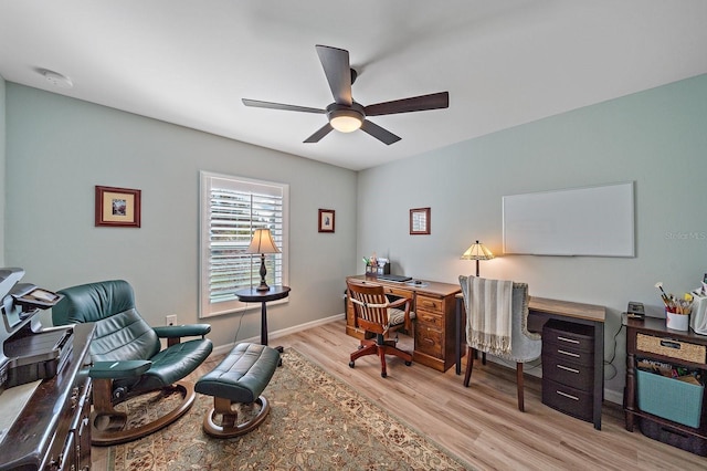 office area featuring light hardwood / wood-style flooring and ceiling fan