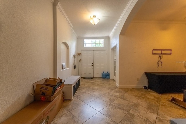 entrance foyer with crown molding