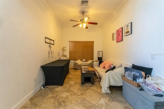 bedroom with ceiling fan and ornamental molding