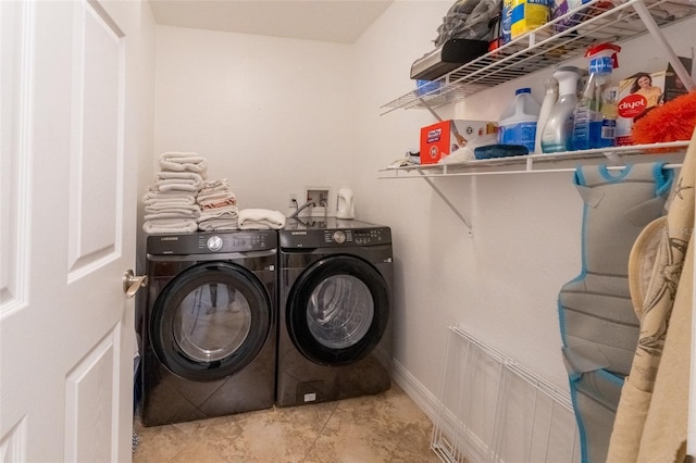 washroom featuring separate washer and dryer