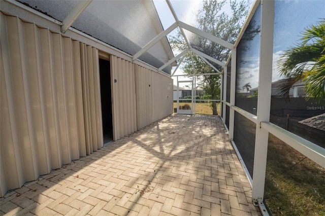 sunroom / solarium with vaulted ceiling