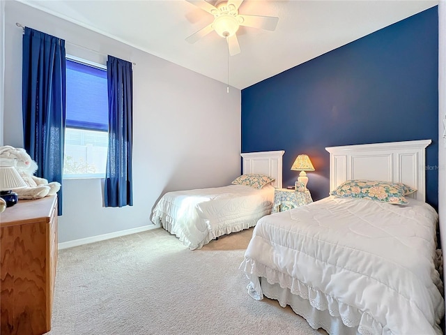 bedroom featuring light colored carpet, ceiling fan, and lofted ceiling