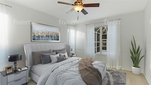 bedroom with ceiling fan and wood finished floors