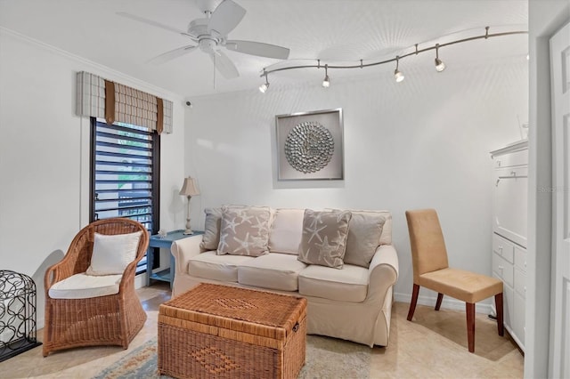 living room featuring crown molding and ceiling fan