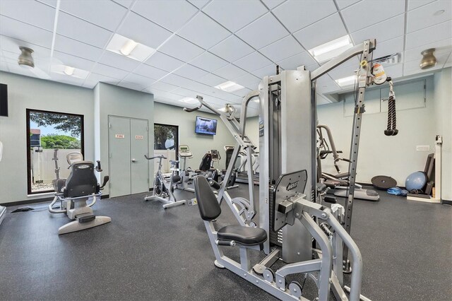 workout area with a drop ceiling