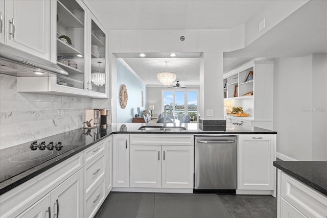 kitchen with sink, tasteful backsplash, stainless steel dishwasher, pendant lighting, and white cabinets