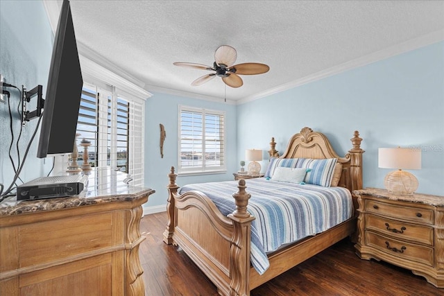 bedroom with ceiling fan, dark hardwood / wood-style floors, ornamental molding, and a textured ceiling