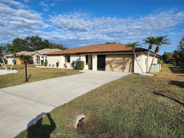 ranch-style house with a garage and a front lawn