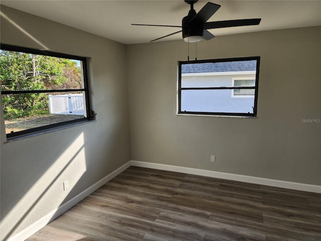 unfurnished room featuring ceiling fan and wood-type flooring