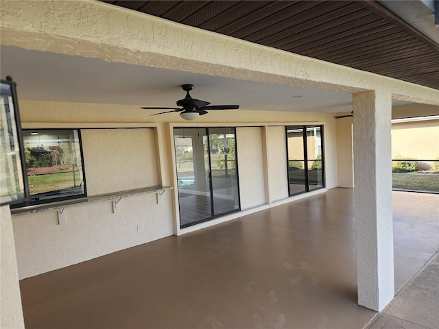 view of patio with ceiling fan